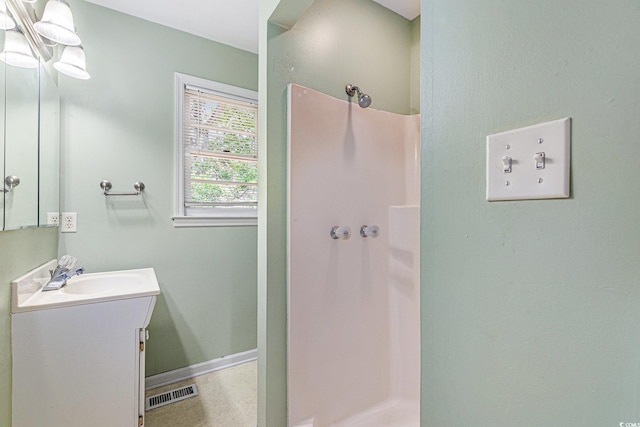 910 N Dogwood Dr, Surfside Beach, SC 29575 - full bath featuring vanity, walk in shower, and baseboards