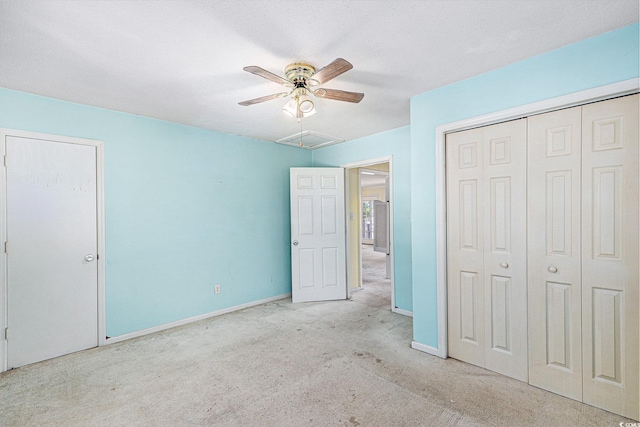 910 N Dogwood Dr, Surfside Beach, SC 29575 - unfurnished bedroom featuring attic access, carpet flooring, baseboards, a ceiling fan, and a closet