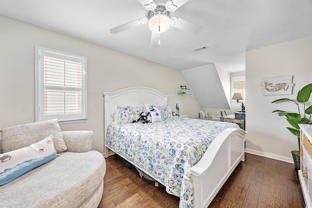 4534 Landing Rd, Little River, SC 29566 - bedroom featuring dark wood-style flooring, a ceiling fan, and baseboards