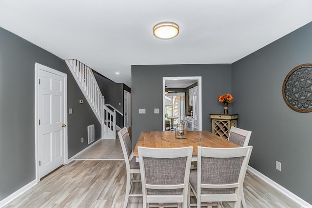 4018 Fairway Lakes Dr Unit 4018, Myrtle Beach, SC 29577 - dining area with stairway and light wood-style flooring