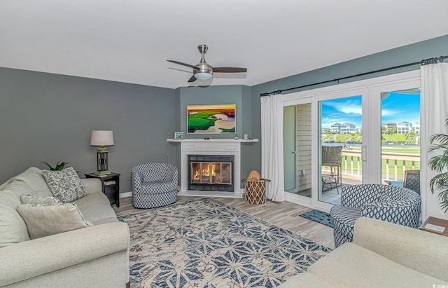 4018 Fairway Lakes Dr Unit 4018, Myrtle Beach, SC 29577 - living room featuring ceiling fan, wood finished floors, and a glass covered fireplace