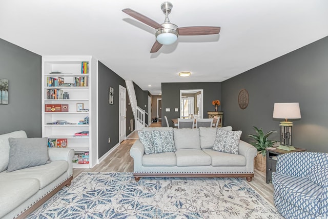 4018 Fairway Lakes Dr Unit 4018, Myrtle Beach, SC 29577 - living room featuring a ceiling fan, light wood-style flooring, stairway, and built in shelves