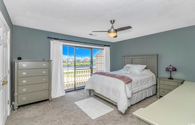 4018 Fairway Lakes Dr Unit 4018, Myrtle Beach, SC 29577 - bedroom featuring carpet floors, access to exterior, a ceiling fan, and a water view