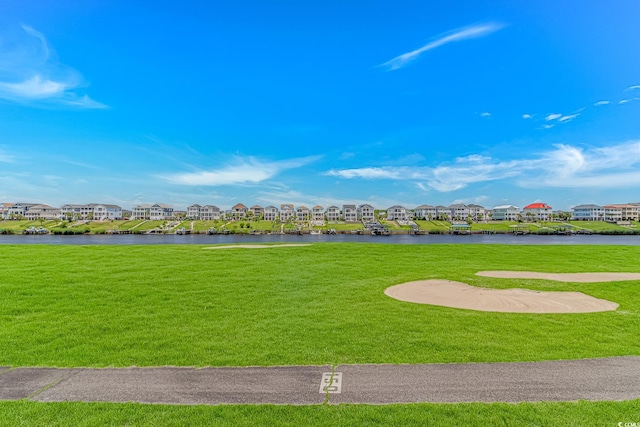4018 Fairway Lakes Dr Unit 4018, Myrtle Beach, SC 29577 - view of community featuring a yard, a residential view, and a water view