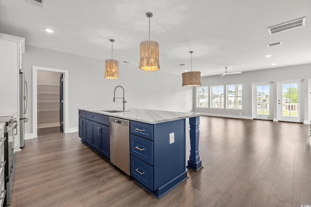135B Sunset Dr, Murrells Inlet, SC 29576 - kitchen featuring appliances with stainless steel finishes, blue cabinets, a sink, a kitchen breakfast bar, and dark wood-type flooring