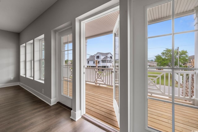 135B Sunset Dr, Murrells Inlet, SC 29576 - doorway featuring dark wood-type flooring and baseboards