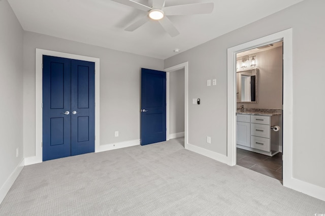 135B Sunset Dr, Murrells Inlet, SC 29576 - unfurnished bedroom with carpet, a closet, baseboards, and a sink