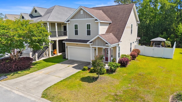 309 Foxpath Loop, Myrtle Beach, SC 29588 - view of front of house with board and batten siding, a gazebo, a shingled roof, an attached garage, and concrete driveway