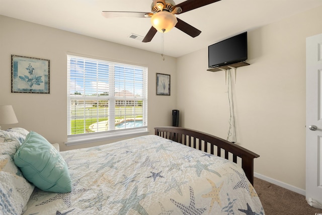 357 Southern Breezes Cir, Murrells Inlet, SC 29576 - carpeted bedroom featuring baseboards and a ceiling fan