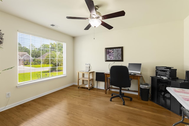 357 Southern Breezes Cir, Murrells Inlet, SC 29576 - home office featuring a ceiling fan and light wood-style flooring