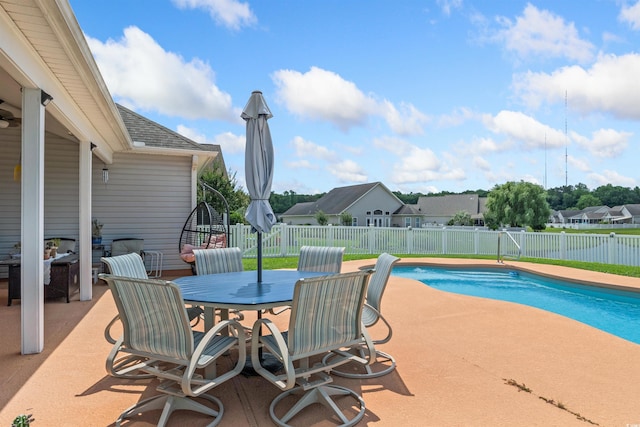 357 Southern Breezes Cir, Murrells Inlet, SC 29576 - view of swimming pool featuring a patio area, a fenced backyard, a residential view, and outdoor dining space