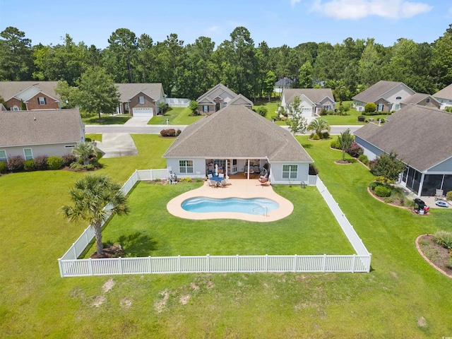 357 Southern Breezes Cir, Murrells Inlet, SC 29576 - rear view of house featuring a fenced backyard, a patio area, and a residential view