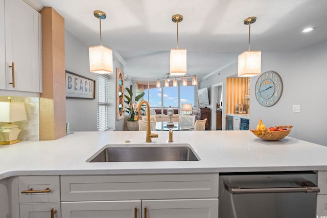 603 S Ocean Blvd Unit 1504, North Myrtle Beach, SC 29582 - kitchen featuring dishwasher, light countertops, open floor plan, decorative backsplash, and decorative light fixtures