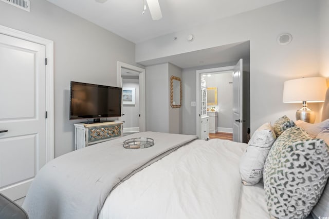 603 S Ocean Blvd Unit 1504, North Myrtle Beach, SC 29582 - bedroom with a ceiling fan and connected bathroom