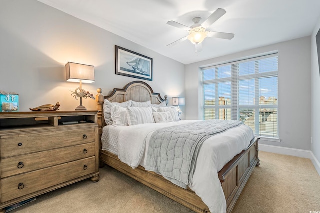 603 S Ocean Blvd Unit 1504, North Myrtle Beach, SC 29582 - bedroom featuring light colored carpet and a ceiling fan