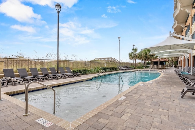 603 S Ocean Blvd Unit 1504, North Myrtle Beach, SC 29582 - community pool featuring a patio area
