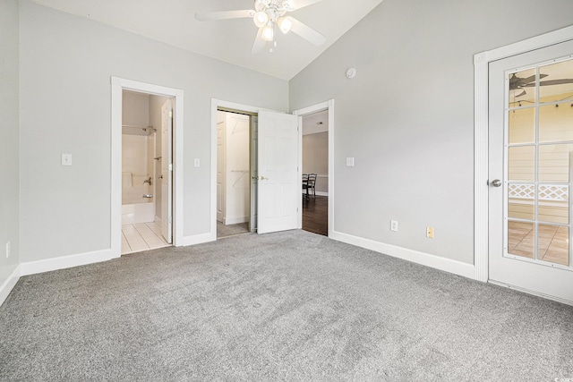 4721 Hibiscus Dr Unit 3-302, Little River, SC 29566 - unfurnished bedroom featuring light colored carpet, ensuite bath, and high vaulted ceiling