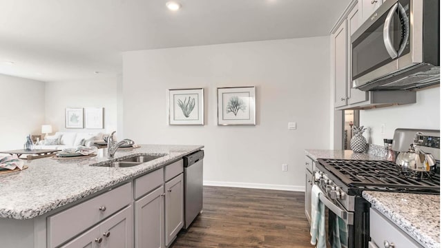 3554 Ashridge Way, Conway, SC 29526 - kitchen featuring stainless steel appliances, gray cabinets, dark wood-style floors, light stone countertops, and recessed lighting