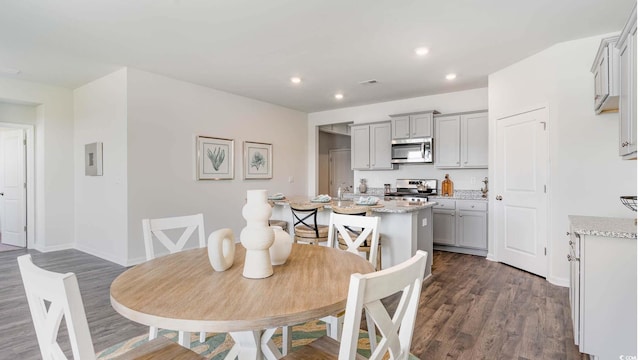 3554 Ashridge Way, Conway, SC 29526 - dining space with dark wood-style flooring and recessed lighting