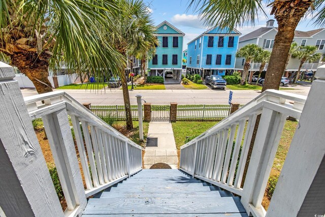 22 Ocean Blvd N, Surfside Beach, SC 29575 - porch with a fenced front yard
