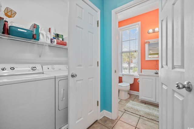 22 Ocean Blvd N, Surfside Beach, SC 29575 - washroom with washing machine and dryer and light tile patterned floors