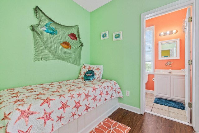 22 Ocean Blvd N, Surfside Beach, SC 29575 - bedroom featuring wood finished floors and baseboards