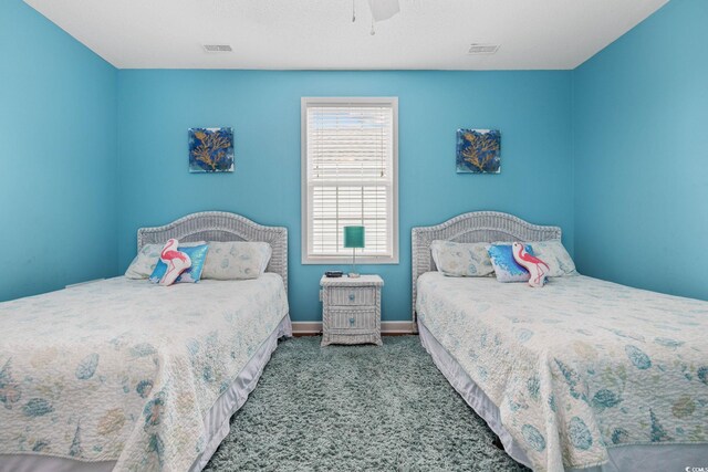 22 Ocean Blvd N, Surfside Beach, SC 29575 - carpeted bedroom featuring a ceiling fan and baseboards