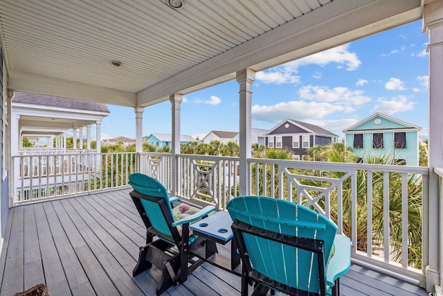 22 Ocean Blvd N, Surfside Beach, SC 29575 - wooden deck with a residential view