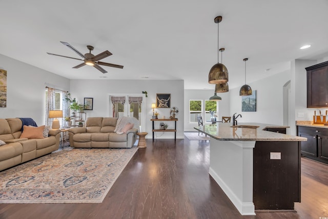 321 Sanctuary Ct, Myrtle Beach, SC 29588 - living area with ceiling fan, dark wood finished floors, recessed lighting, and arched walkways