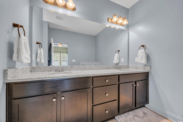 321 Sanctuary Ct, Myrtle Beach, SC 29588 - bathroom with double vanity and a ceiling fan
