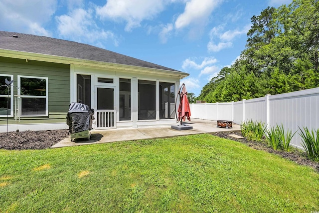321 Sanctuary Ct, Myrtle Beach, SC 29588 - rear view of house featuring a patio area, a sunroom, and a fenced backyard