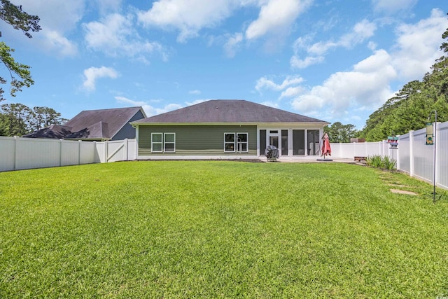 321 Sanctuary Ct, Myrtle Beach, SC 29588 - back of property featuring a fenced backyard and a sunroom