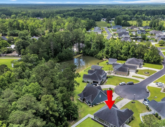 321 Sanctuary Ct, Myrtle Beach, SC 29588 - aerial view of residential area featuring a forest and a large body of water