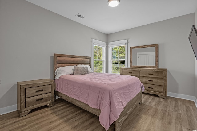 945 Waterbridge Blvd, Myrtle Beach, SC 29579 - bedroom featuring wood finished floors and baseboards