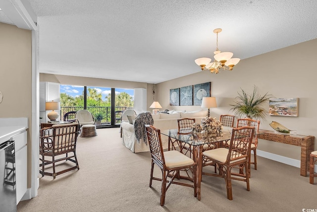 741 Retreat Beach Cir Unit B-1-A, Pawleys Island, SC 29585 - dining room with a chandelier, light colored carpet, and a textured ceiling
