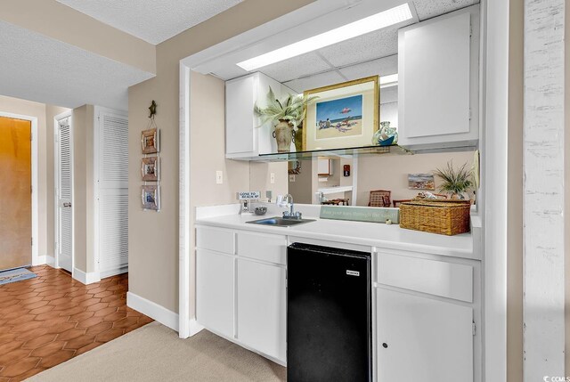 741 Retreat Beach Cir Unit B-1-A, Pawleys Island, SC 29585 - bar with fridge and light tile patterned floors
