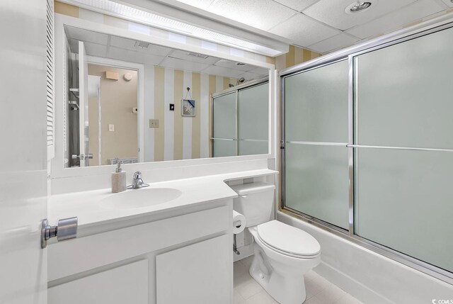 741 Retreat Beach Cir Unit B-1-A, Pawleys Island, SC 29585 - full bath with vanity, tile patterned flooring, wallpapered walls, and combined bath / shower with glass door