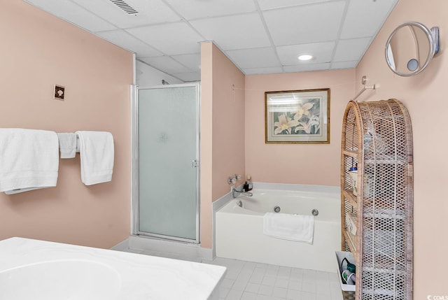 741 Retreat Beach Cir Unit B-1-A, Pawleys Island, SC 29585 - full bathroom featuring a stall shower, a tub with jets, a drop ceiling, and tile patterned flooring