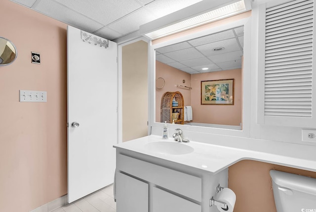 741 Retreat Beach Cir Unit B-1-A, Pawleys Island, SC 29585 - bathroom featuring a drop ceiling, vanity, and tile patterned flooring