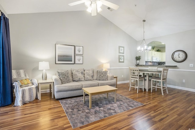 6015 Catalina Dr Unit 634, North Myrtle Beach, SC 29582 - living area featuring high vaulted ceiling, a ceiling fan, wood finished floors, and a chandelier