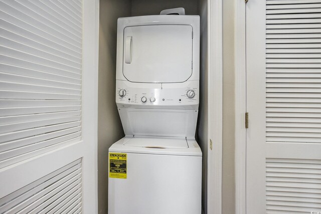 6015 Catalina Dr Unit 634, North Myrtle Beach, SC 29582 - washroom with stacked washer and clothes dryer