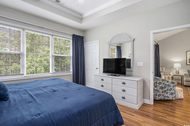 6015 Catalina Dr Unit 634, North Myrtle Beach, SC 29582 - bedroom with crown molding, wood finished floors, and a raised ceiling