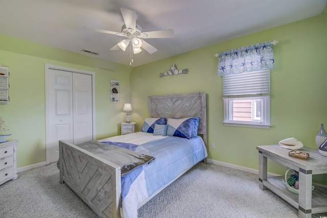 4525 Landing Rd, Little River, SC 29566 - bedroom with carpet, a closet, and a ceiling fan