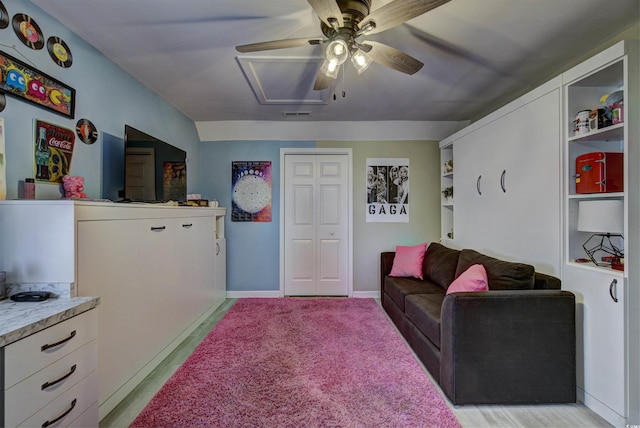 4525 Landing Rd, Little River, SC 29566 - living room featuring a ceiling fan and baseboards