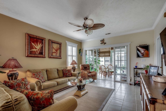 901 W Port Dr Unit 305, North Myrtle Beach, SC 29582 - living area featuring a ceiling fan, light tile patterned floors, ornamental molding, and a textured ceiling