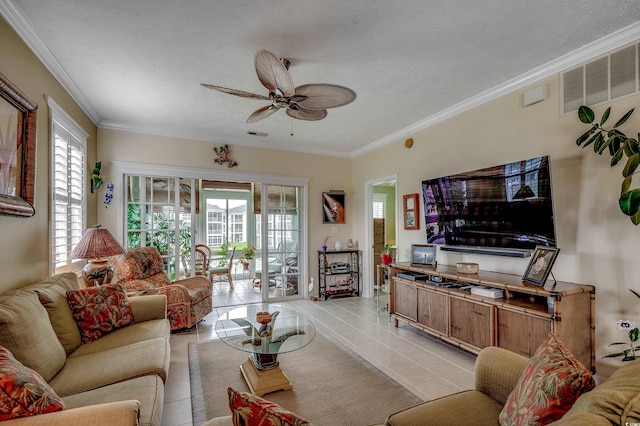 901 W Port Dr Unit 305, North Myrtle Beach, SC 29582 - living room with ceiling fan, ornamental molding, a textured ceiling, and light tile patterned flooring