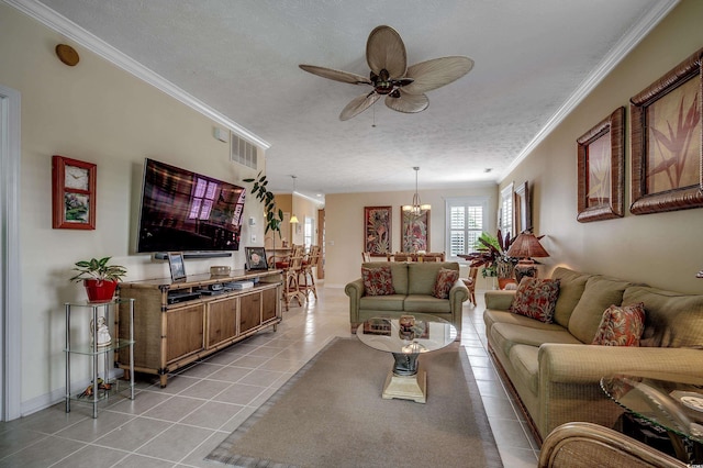 901 W Port Dr Unit 305, North Myrtle Beach, SC 29582 - living area with light tile patterned flooring, ornamental molding, a ceiling fan, a textured ceiling, and a chandelier