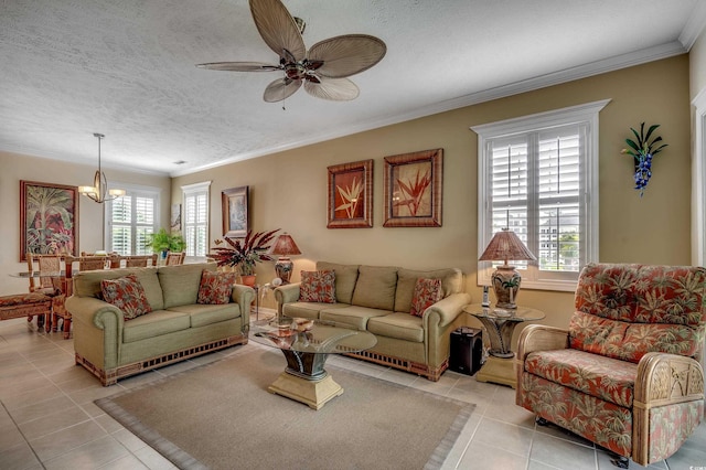 901 W Port Dr Unit 305, North Myrtle Beach, SC 29582 - living room with light tile patterned floors, crown molding, a chandelier, a ceiling fan, and a textured ceiling