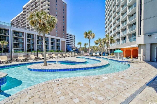 201 74th Ave N Unit 707, Myrtle Beach, SC 29572 - community pool with a patio area
