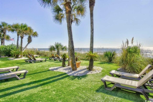 201 74th Ave N Unit 707, Myrtle Beach, SC 29572 - view of property's community featuring a yard and a water view